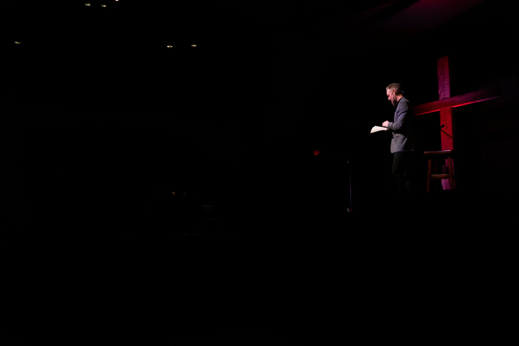 Bradley Williams preaches from the stage